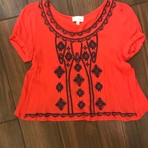 Pink short sleeve embroidered top